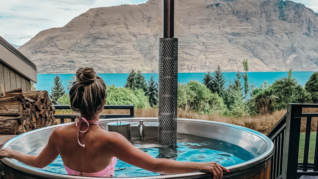 An outdoor jacuzzi at Hidden Lodge Queenstown, one of New Zealand's best boutique hotels