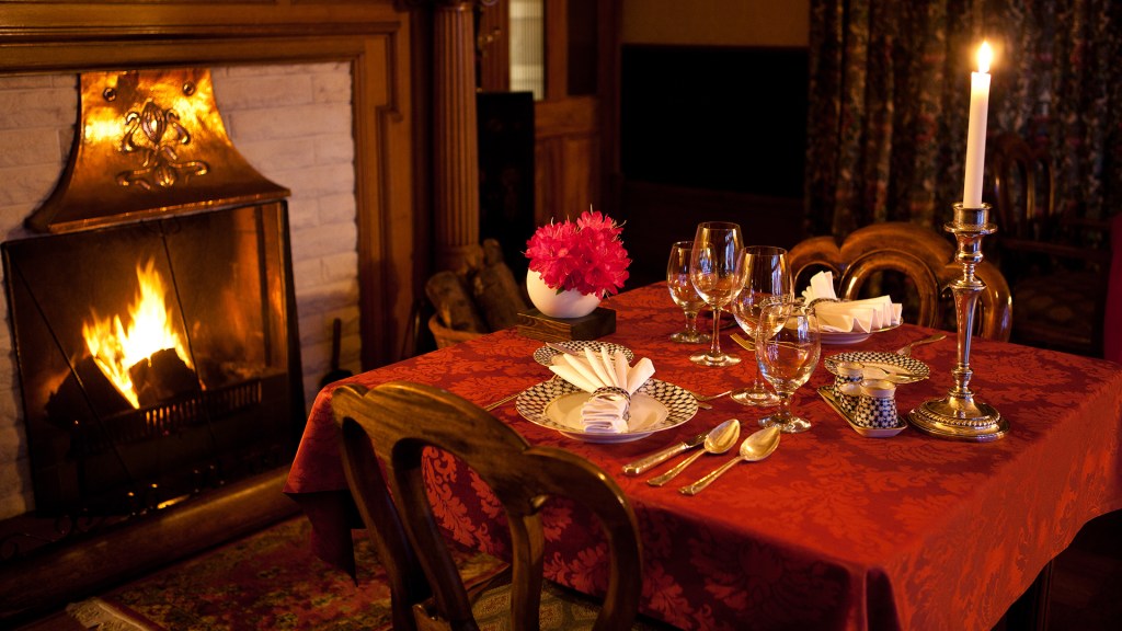 A cozy table setting at the Pen-y-Bryn Lodge dining room, one of New Zealand's best boutique hotels