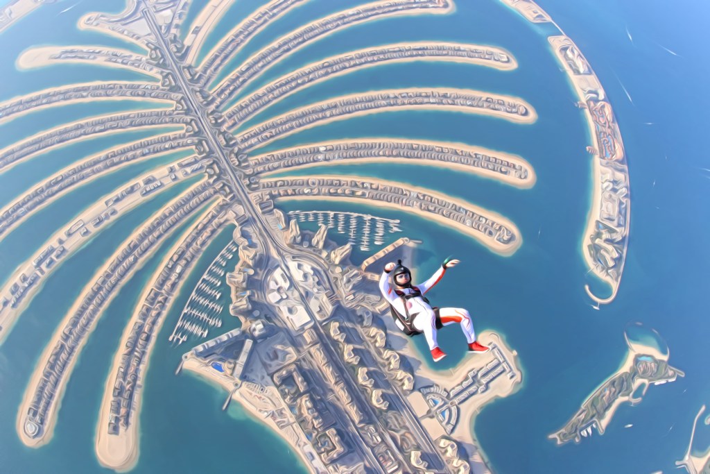 Skydiving over the Palm Jumeirah. Image via Shutterstock, by ViktorKozlov