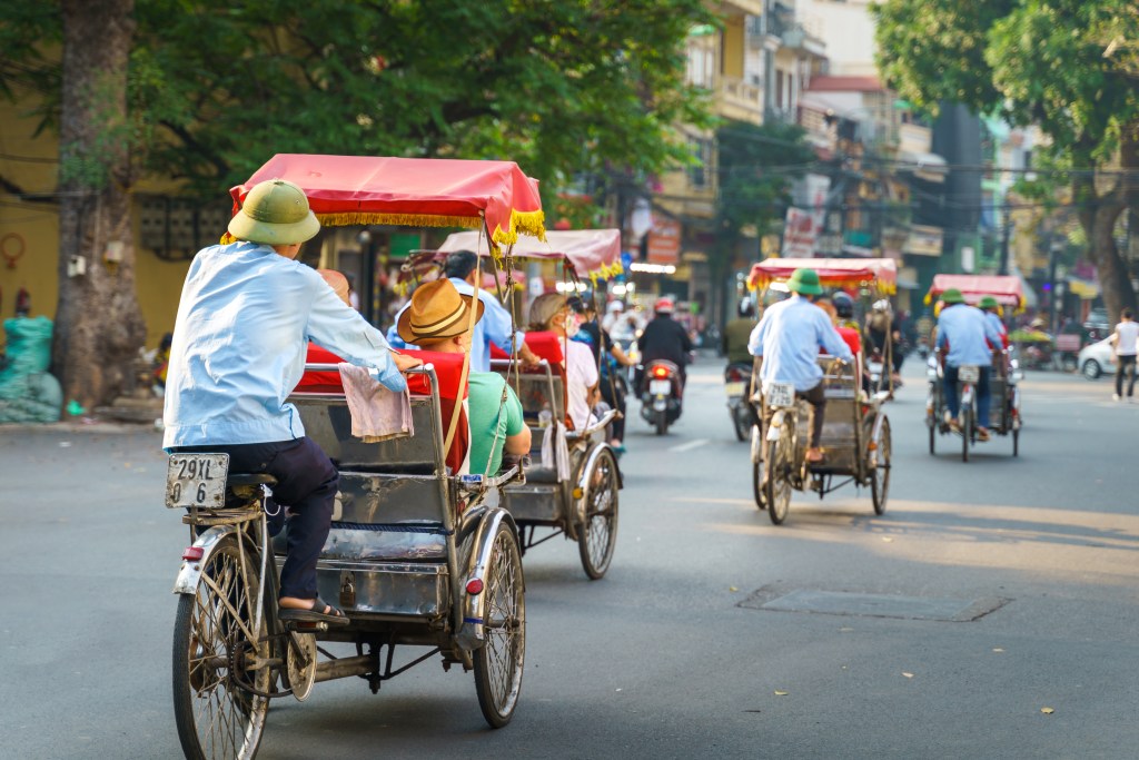An image of cycle-rickshaws in Hanoi, Vietnam - Luxury Escapes