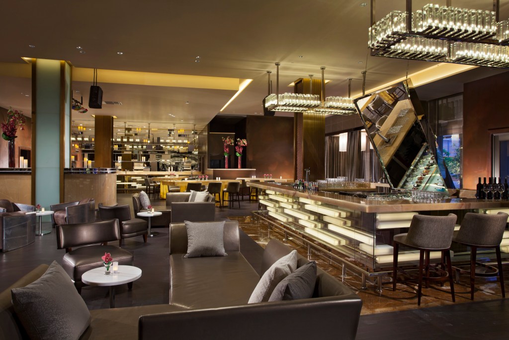 The ZJ's Bar & Lounge at the Mulia Bali, showcasing the modern and glamorous interior decor at the bar and lounge area