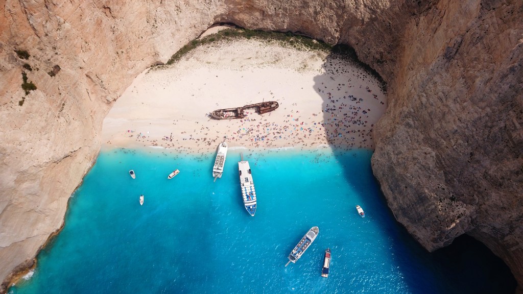A top shot of the fascinating Navagio (Shipwreck Cove) in Zakynthos, one of the best Greek islands - Luxury Escapes