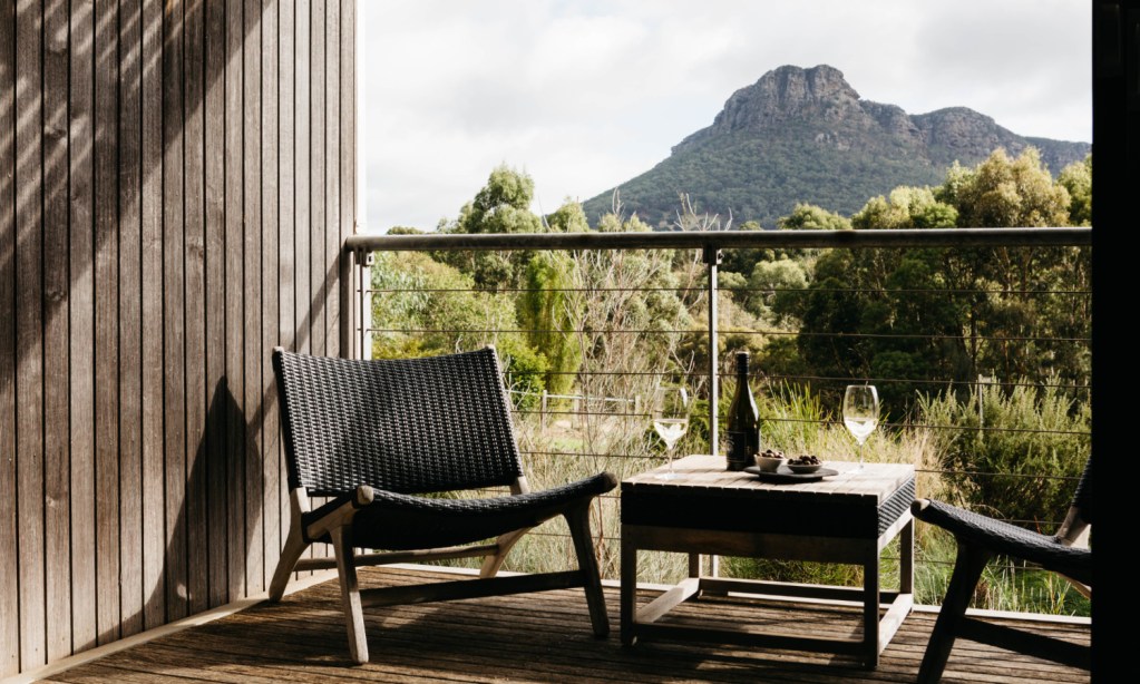 The view from a Royal Mail Hotel balcony overlooking the Victoria bushland and mountain rangers, making it one of country Victoria's best luxury accommodation - Luxury Escapes