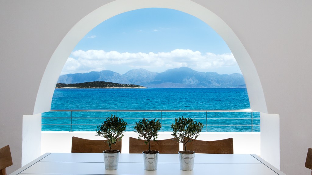 A view of the cerulean sea from the Minos Beach Art Hotel in Crete, one of the best Greek islands - Luxury Escapes