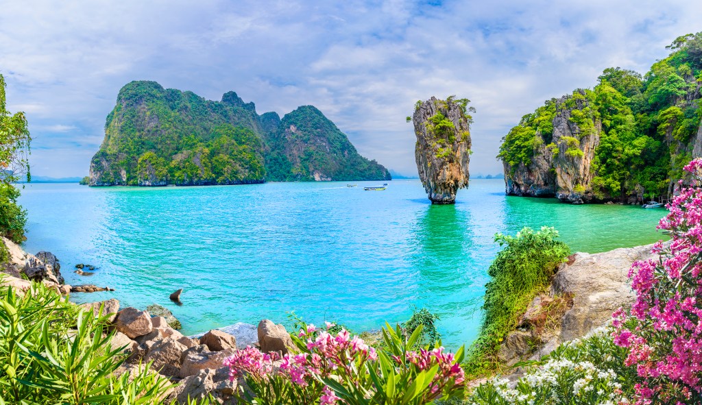 The azure waters of Phang Nga Bay, an unmissable thing to do in Phuket - Luxury Escapes 