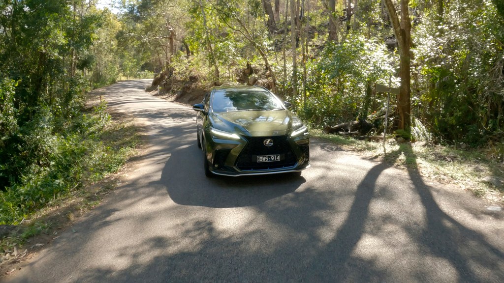 Image of a Lexus car driving the country roads on the Ultimate Queensland Road Trip: Brisbane to Townsville - Luxury Escapes