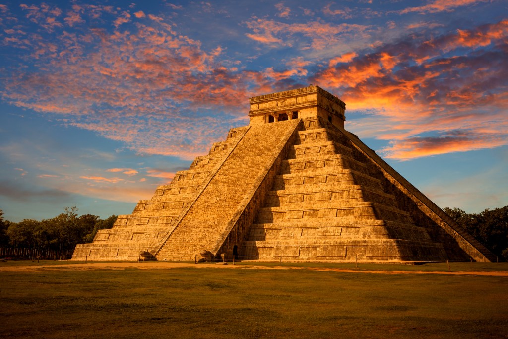 A sunset shot of the UNESCO World Heritage-listed Chichen Itza Mayan, Mexico - Luxury Escapes