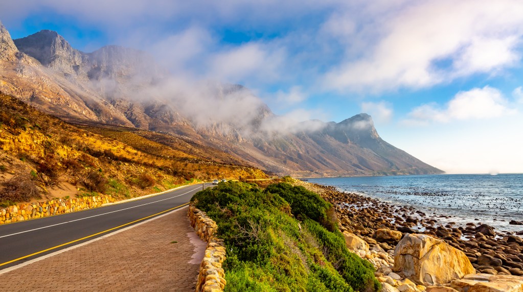 Road next to the beach in South Africa, one of the Top Bucket-List Destinations for 2023 - Luxury Escapes 