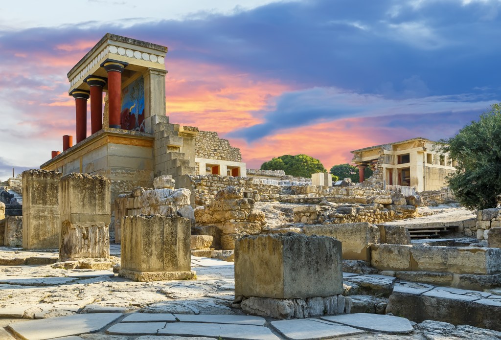 The Palace of Knossos offers a spectacular glimpse into the past, complete with mythological importance, all in Crete, a must-see on any Greek Island itinerary - Luxury Escapes