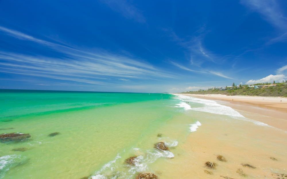 The view of the vibrant waters at Sunshine Beach - Luxury Escapes  