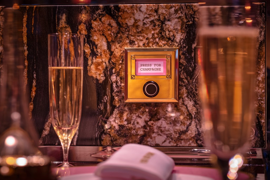 Press for champagne at Bob Bob Ricard, Soho, one of London's best restaurants. Image used with permission.
- Luxury Escapes