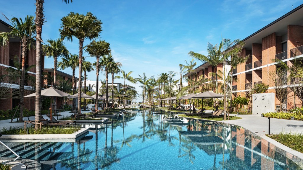 The pool area at the Pullman Khao Lak Resort in Thailand, one of the best family friendly resorts - Luxury Escapes