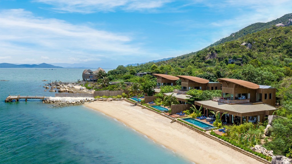 A view of the bay and rainforests surrounding An Lam Retreats Ninh Van Bay, Vietnam, one of the best family-friendly destinations - Luxury Escapes 