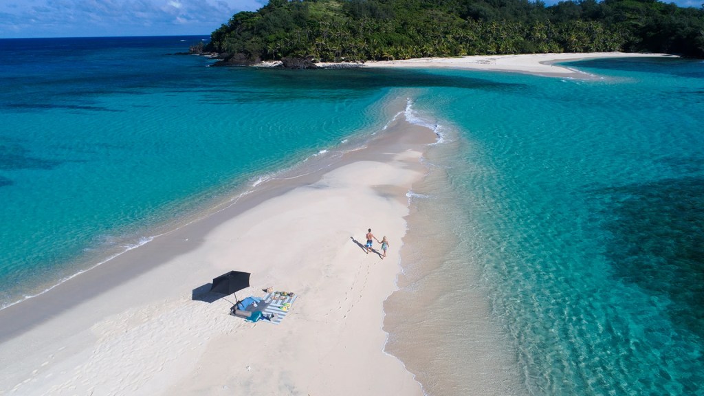 A beach at Yasawa Island Resort & Spa, one of the destinations of Fiji's islands - Luxury Escapes